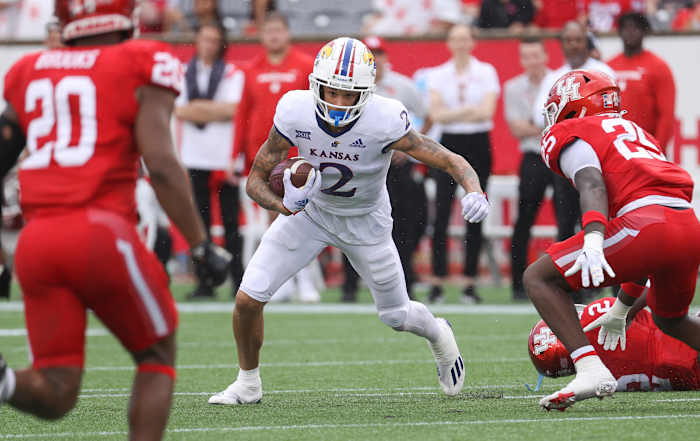 Sep 17, 2022; Houston, Texas, USA; Kansas Jayhawks wide receiver Lawrence Arnold (2) runs with the ball during the second quarter against the Houston Cougars at TDECU Stadium. Mandatory Credit: Troy Taormina-USA TODAY Sports
